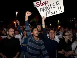 Arab-Israelis take part in a demonstration against the against the Prawer plan in the northern Israeli city of Haifa on November 30, 2013. The so-called Prawer-Begin Bill calls for the relocation of 30,000-40,000 Bedouin in the Negev - 80 percent of which support the law, according to Israeli official Dror Almog. (AFP)
