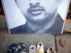 A poster of Iraqi journalist Muntazer Al-Zaidi, who famously threw a shoe at President George Bush in 2008.