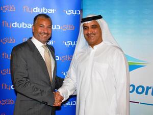 Ghaith Al Ghaith, CEO of flydubai shaking hands with Rabih Saab, President and Managing Director of Travelport at ATM 2011