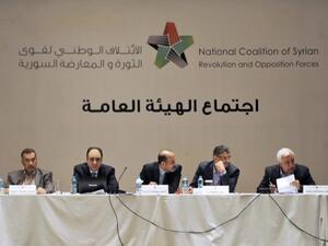 (From L-R) Member of the General Secretariat of the Syrian National Council Mohammad Farouk Tayfour, General Secretary of the Syrian National Council Bader Jamous, chief of the Syrian National Council (SNC) Ahmad Jarba (C), and member of the coalition Monzer Akbik attend a meeting of the National Coalition of Syrian Revolution and Opposition forces on September 13, 2013, in Istanbul. (AFP)
