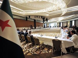 Ahmad Tumeh was elected provisional PM of the SNC on Saturday. Here, members of Syrian National coalition (SNC) attend a meeting of the National Coalition of Syrian Revolution and Opposition forces on September 13, 2013, in Istanbul. (AFP)