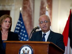 Saeb Erekat's comments represent the first time that Palestine has agreed to the goal of finding a preliminary deal as a first step to a final deal (File Archive/AFP)