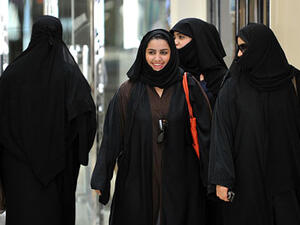 Saudi women leaving a mall.