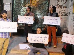 Protesters in front of the Sawy Culturewheel.