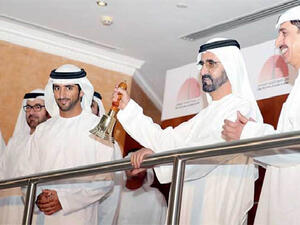 Sheikh Mohammed rings the bell at the Dubai Financial Market on Wednesday. (Image courtesy: WAM news agency)
