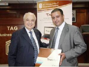 Dr. Abu Ghazaleh with the winner, Waleed Al-Maitah