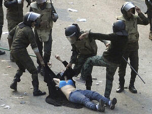 The image seen around the world of the Egyptian exposed woman. (Image courtesy of "thealantic.com")