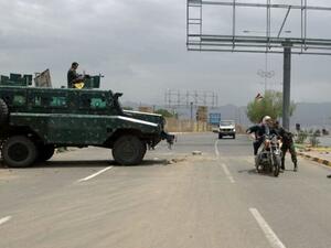 Yemeni soldiers search a motorbike at a checkpoint on a street leading to the US embassy in Sanaa on August 4, 2013 (AFP/File)