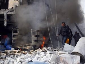 Regime airstrikes targeting a rebel compound left 26 dead Saturday after the attack missed its target and hit the nearby Nafasin market (Mohammed Al Khatieb/AFP)