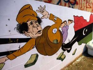A whole slew of cartoon and joke material have emerged from Libya's faltering leader Gaddafi, but now his people too are making a cartoon of themselves.