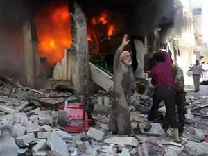 Government warplanes launched airstrikes throughout Aleppo Tuesday (AP)