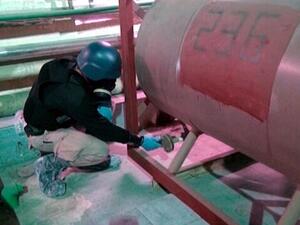 After inspecting 21 out of the 23 chemical production facilities, OPCW announced in a statement that it "is satisfied [it] has verified, and seen destroyed, all declared critical production/mixing/filling equipment [in Syria]" (EPA) 