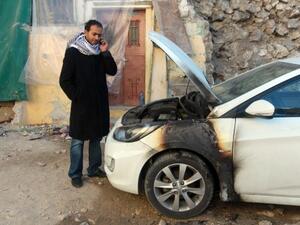 Israeli settlers burnt two Palestinian cars near Nablus (Jaafar Ashtiyeh/AFP)