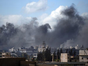 Syria warplanes launched strikes in the Damascus suburb of Mleha Monday after rebels seized the area's checkpoint from government forces (AFP)