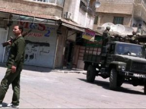 جنود سوريون في احدى ضواحي دمشق
