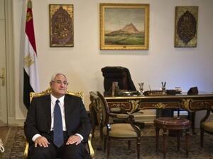 Interim President Adly Mansour made the announcement about the switch in the order of presidential and parliamentary elections a day after Egypt's revolution anniversary clashes left dozens killed (File Archive/AFP)