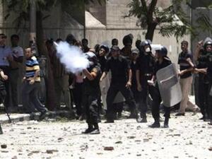 Egyptian police try to maintain calm in response to rioting over the film by Sam Bacile.