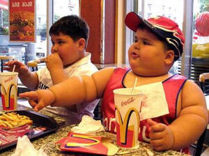 Americans top the cake as heaviest in the world, and then they eat that very cake