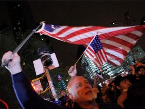 American's show little decorum as they celebrate death at the site of a mass grave of sorts at Ground Zero