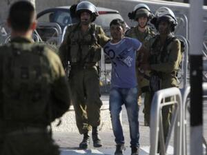 30 Palestinian children from Qalqiliya are currently being detained in Israeli prisons. (AFP)
