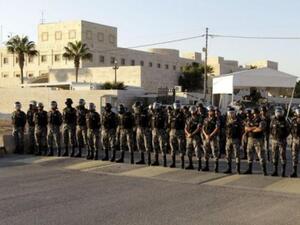 Jordanian riot police ready for a night of battle in Amman.