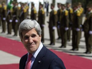 U.S. Secretary of State John Kerry warned Iraq about indirectly aiding the Syrian regime. (AFP)