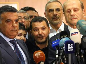 Major General Abbas (L) brokered the deal to release the nine Lebanese captives with Syrian rebels in Damascus Friday (AFP)