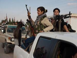 Kurdish fighter on patrol in Syria. (AFP)