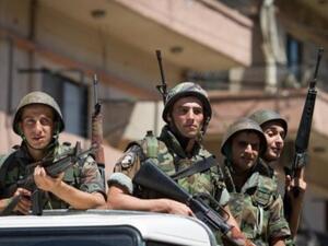 Lebanese soldiers patrol the northern town of Tripoli in June. (AFP/File)