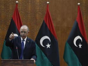 رئيس الوزراء الليبي عبدالرحيم الكيب خلال مؤتمر صحفي في طرابلس
