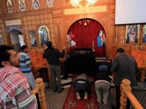 الاقلية المسيحية بليبيا مصدومة من الهجوم على كنيسة الدافنية  