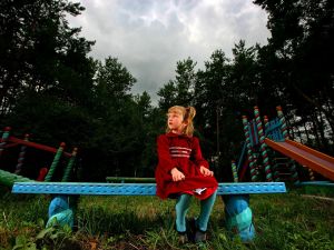 Playground play- otherwise assumed to be innocent and harmonious- is often a stressful time for children who experience
 bullying or segregation or discrimination.  This can be drawn from applied behaviors from the home and parents.