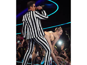 Miley Cyrus shocked celebs and viewers alike with her trashy fashion choices and un-ladylike behavior. (Image: Facebook)