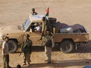 مقاتلون من المعارضة على بعد مئة كيلومترا جنوبي طرابلس
