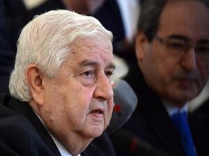 Syrian Foreign Minister Walid Muallem (L) gives a press conference with his Russian counterpart Sergei Lavrov on September 9, 2013 following a meeting in Moscow. (AFP)