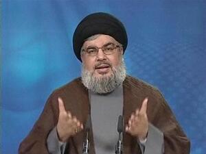 Hezbollah's leader Hassan Nasrallah has vowed not to allow Syrian rebels take Syrian towns bordering Lebanon (Reuters)