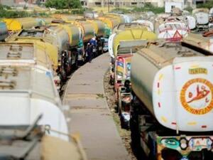 Oil tanks line up in the Middle East.