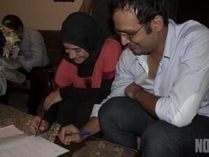 Although several Lebanese sheiks have labeled them infidels, these two call see themselves simply as happy and hitched.