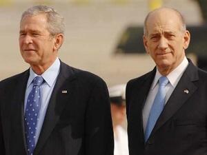 Ehud Olmert pictured here with former U.S. President George W. Bush, served as Israel's prime minister from 2006-2008 before resigning over graft allegations (File Archive/AFP)