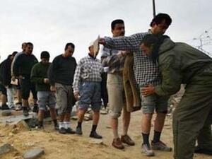 Palestinian workers wait to enter the Israeli industrial zone next to the border with Gaza (picture courtesy of B'Tselem)