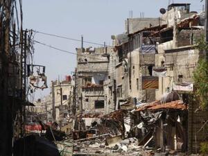 Clashes between rebels and regime forces have destroyed the neighborhoods near Sayeda Zainab (Courtesy of Voice of America)