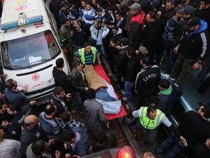 Medics take care of one of the 34 individuals wounded in Tuesday's bomb attack. An additional four people were killed (STR/AFP)