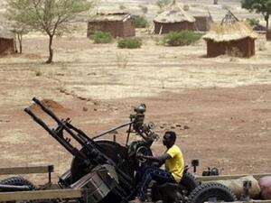 مقاتل من الجيش الشعبي لتحرير السودان على سلاح مضاد للطائرات في جنوب كردفان 
