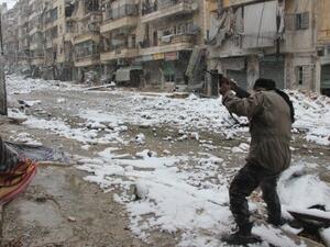 The recent snow has done little to stop the fighting between Syrian rebel and regime forces (Medo Halab/AFP)