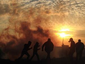 Israelis fired tear gas on Palestinian protestors last week, leading to the death of an 85-year-old man (Jaafar Ashtiyeh/AFP)