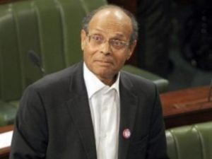 المرزوقي يتعهد بضمان كرامة التونسيين