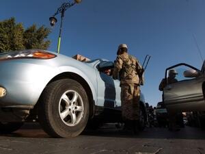 The Al Qaeda gunmen shot the three soldiers at a checkpoint Saturday (Mohammed Huwais/AFP)
