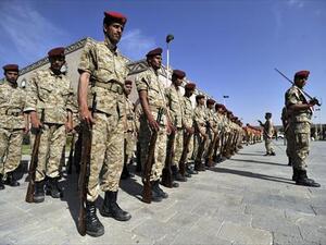 Yemeni soldiers parade during the funeral of the victims of bombing attacks on the Gulf of Aden on September 22, 2013 at a mosque in the capital Sanaa. (AFP)