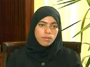 صورة وزعتها سانا لسيدة قالت انها زينب الحصني خلال مقابلة مع التلفزيون الرسمي