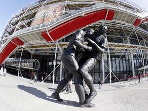 Qatar has a statue of French soccer player Zidane's headbutt to an Italian player. (image courtesy of Big Soccer)